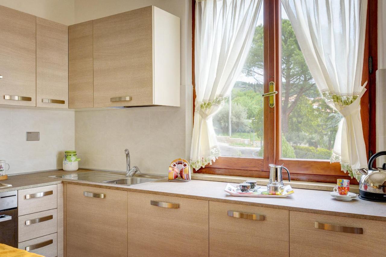 Appartamento Luisa - Vista Lago ปัสซีญาโน ซุล ตราซีเมโน ภายนอก รูปภาพ
