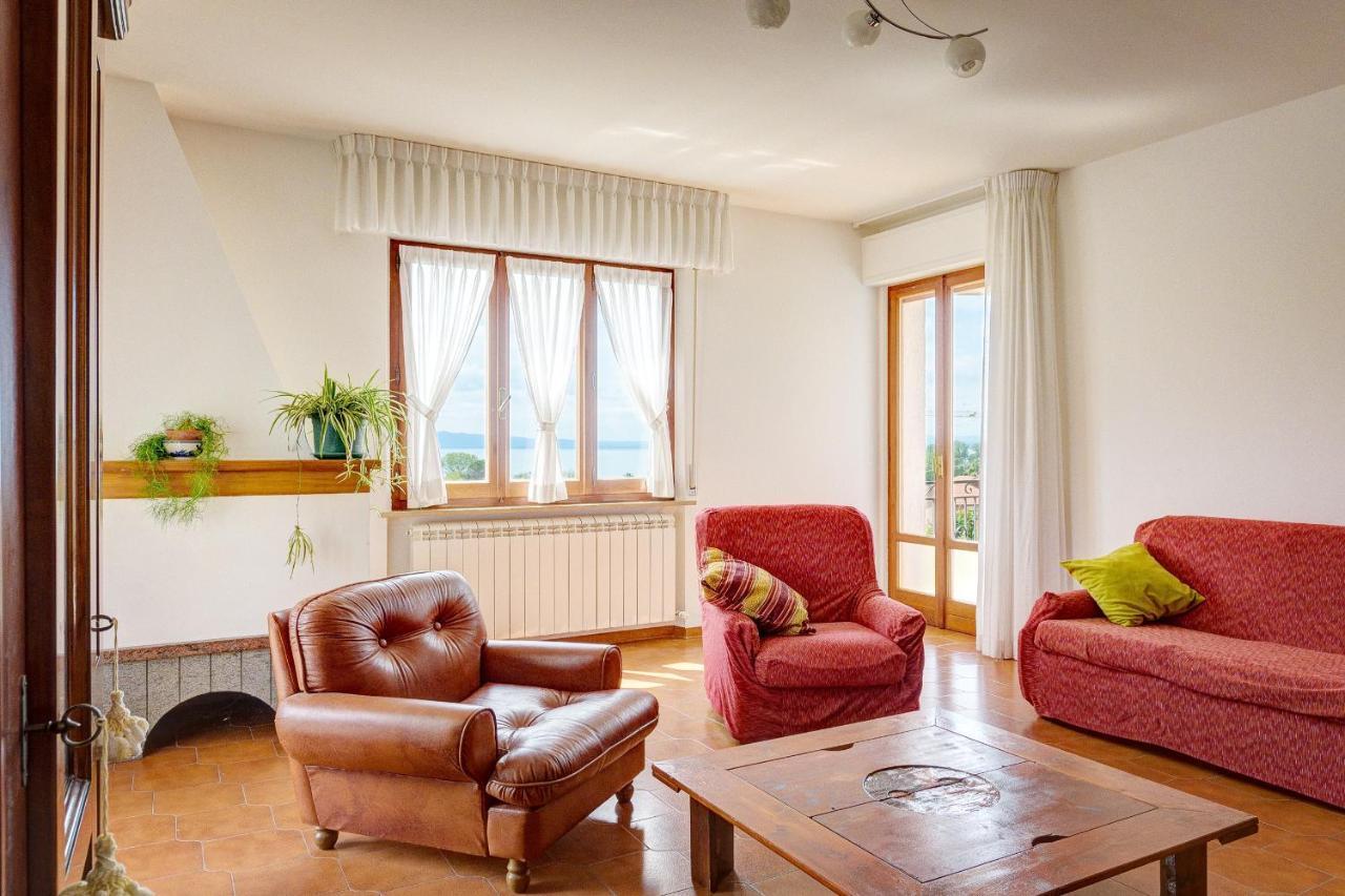 Appartamento Luisa - Vista Lago ปัสซีญาโน ซุล ตราซีเมโน ภายนอก รูปภาพ