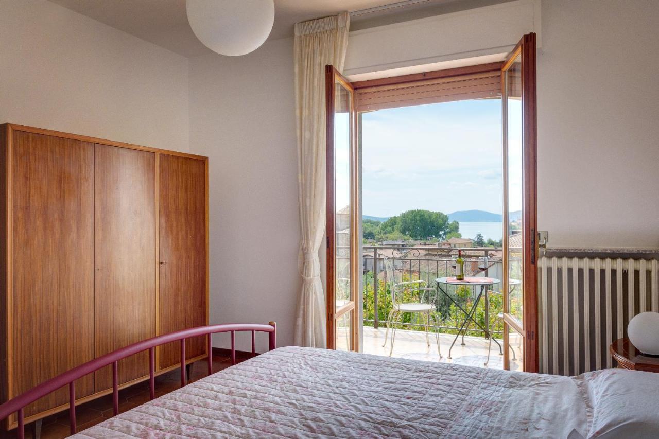 Appartamento Luisa - Vista Lago ปัสซีญาโน ซุล ตราซีเมโน ภายนอก รูปภาพ