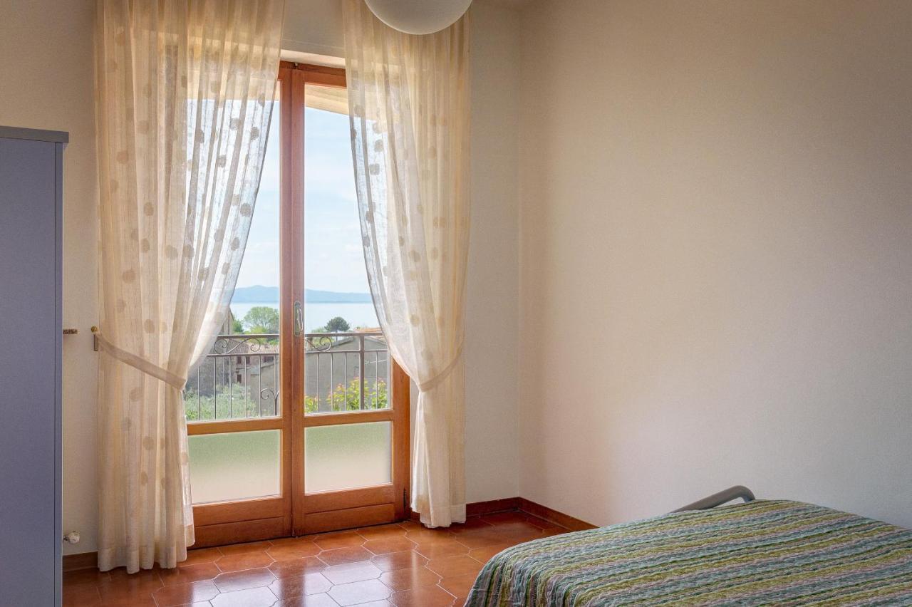 Appartamento Luisa - Vista Lago ปัสซีญาโน ซุล ตราซีเมโน ภายนอก รูปภาพ
